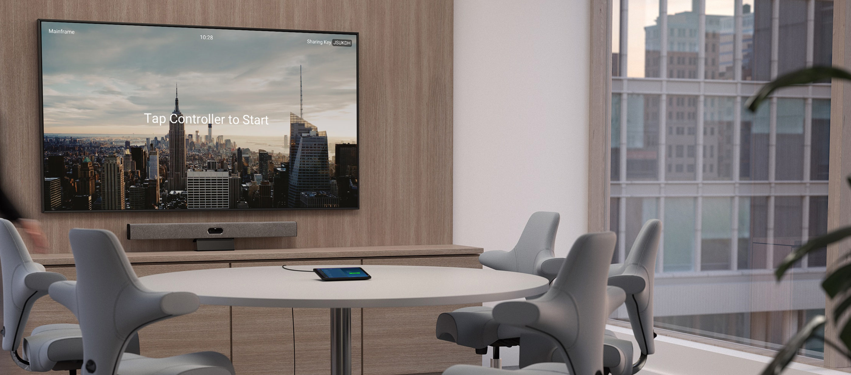 Beitragsbild Set Neat Bar, Neat Pad and Samsung QM65R Image showing set of tv screen and neat pad in a meeting space